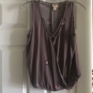 Purple floral sleeveless blouse